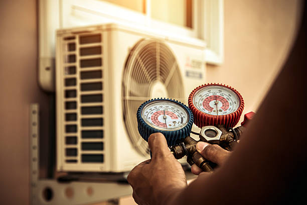 Professional Heat Pump Repair technician working in Huntsville, UT